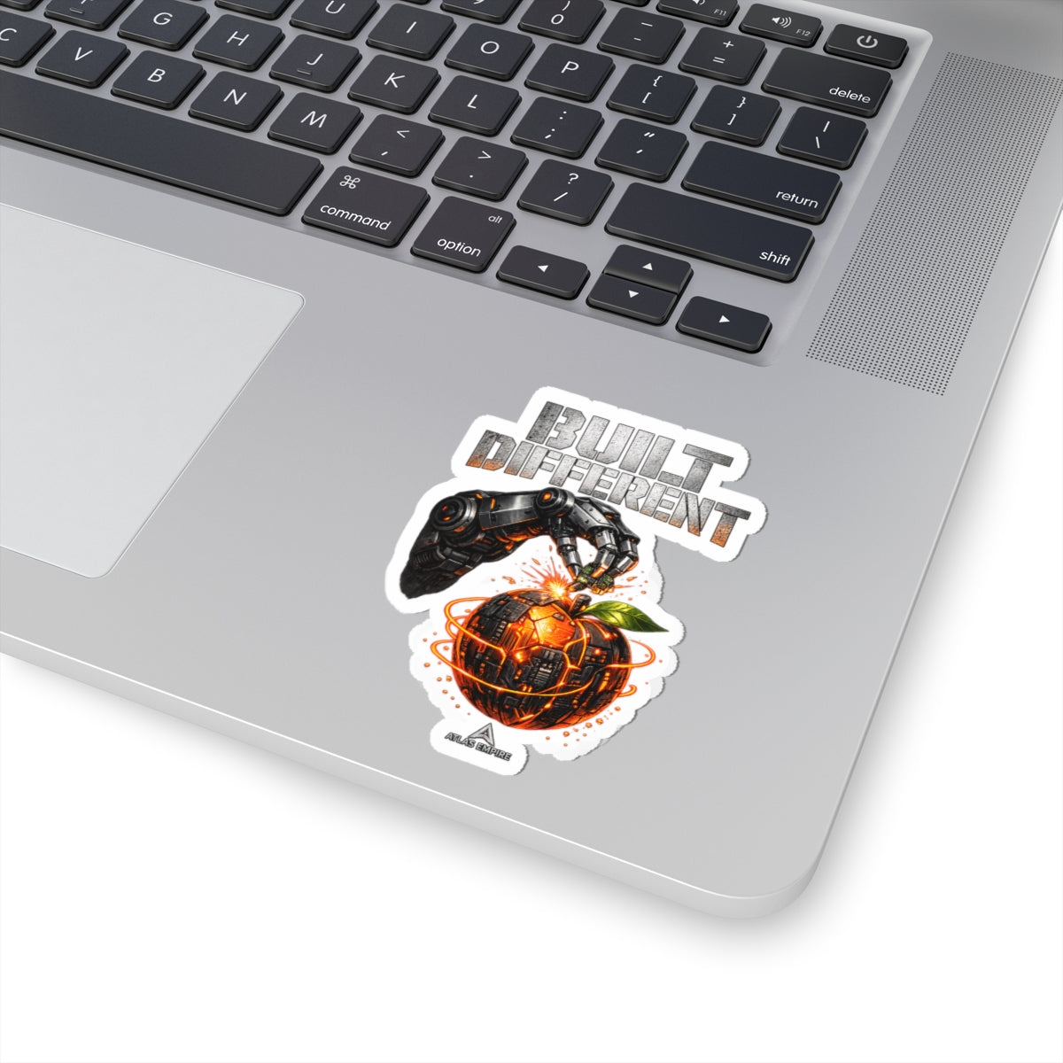 Built Different Robot Arm Orange Sticker — Kiss-Cut Laptop Decal